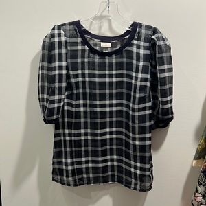 Small, see-through top. Super cute for any occasion!